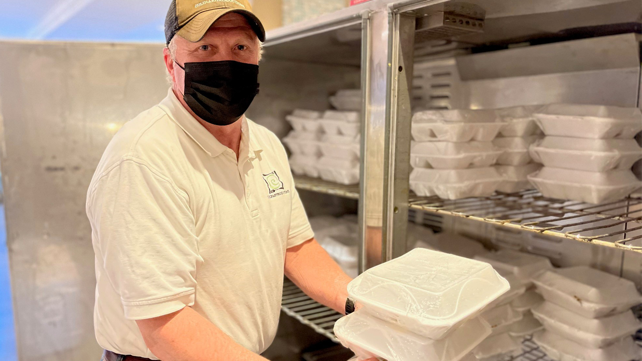 Culinary Productions Owner and Chef William T. Wells, C.E.C. distributing meals for workers traveling to support River Bend Station's refueling outage.